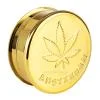 Grinder en acrylique 3 parties, couleur dorée avec feuilles de cannabis et inscription Amsterdam