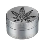 Metal grinder cannabis leaf with sieve for pollen filtering